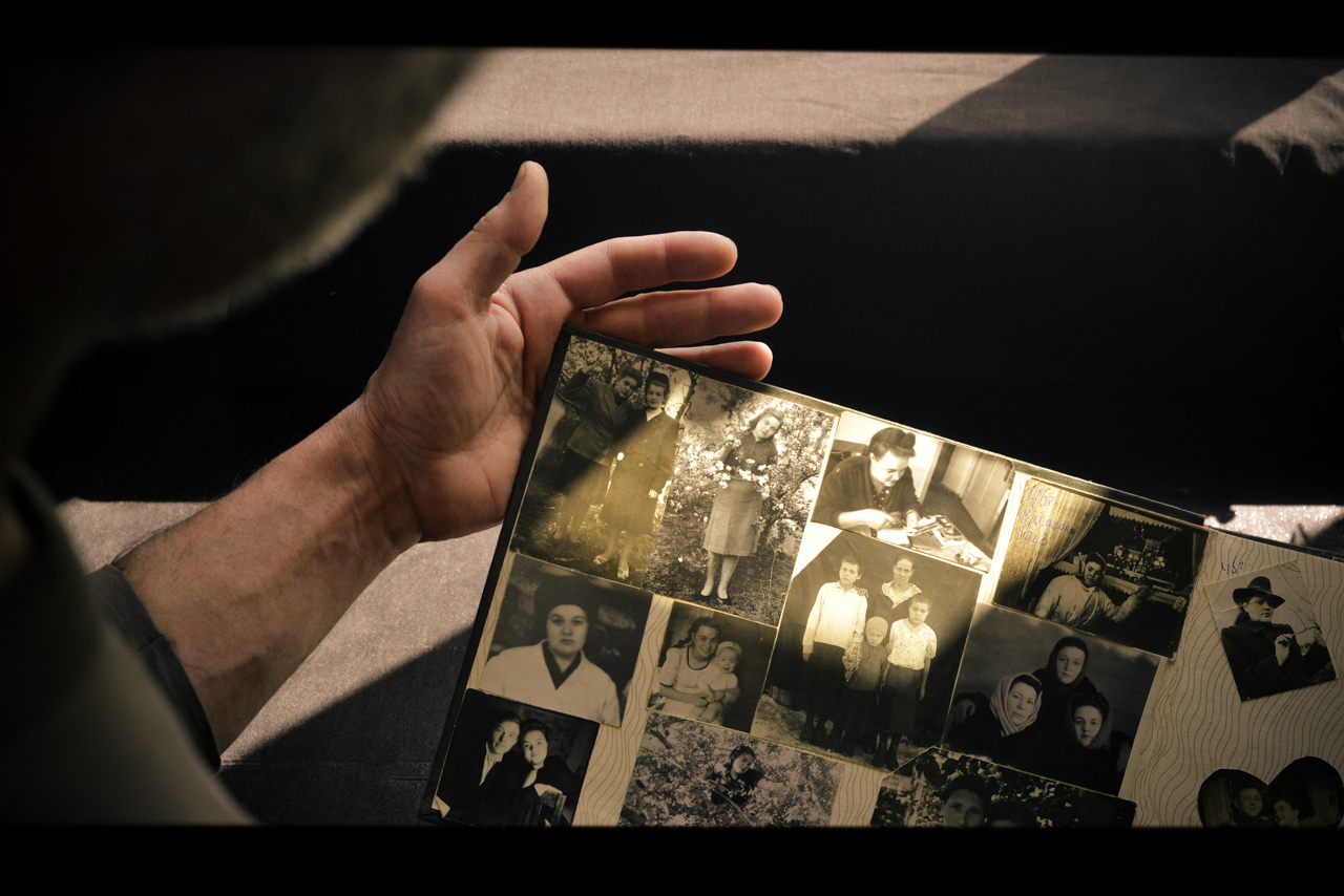 hands_with_album.jpg
